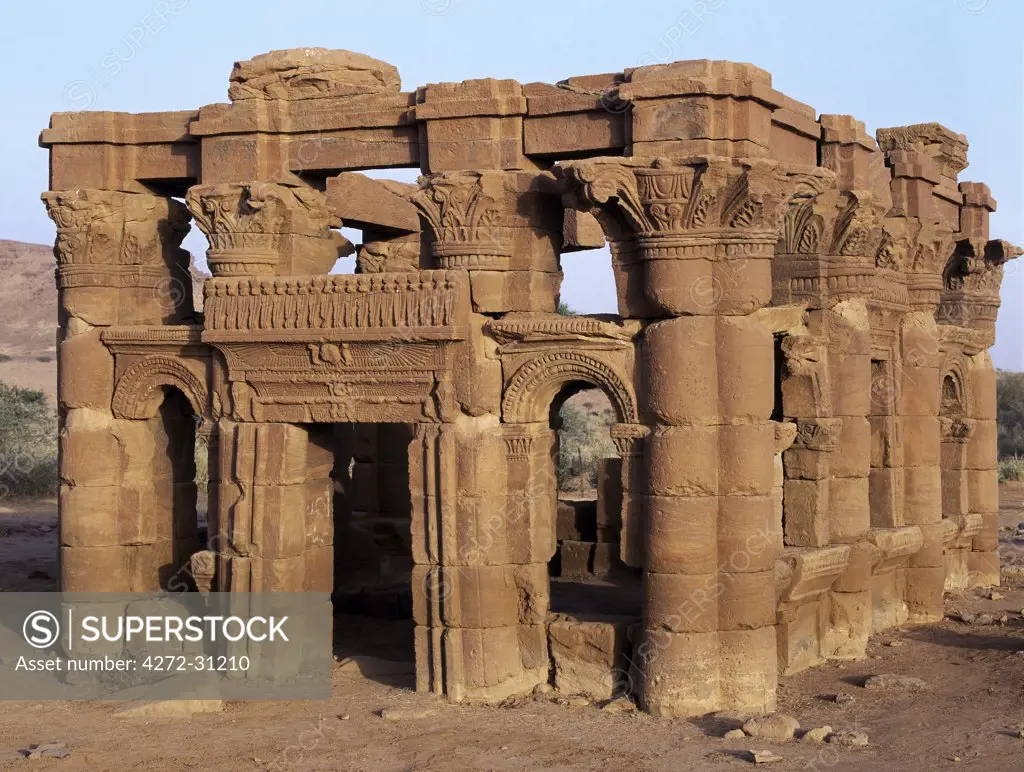 The ruins of a Kiosk beside one of the four temples situated beside an important wadi at Naga some 30 km from the Nile. Discovered in 1821, the temples have been dated between 1BC and 1AD. They are fine examples of Afro-Egyptian architecture and are attributed to the Meroitic culture that flourished at that time.