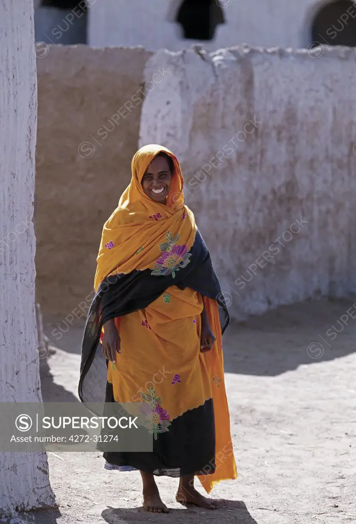 Nubian women wear bright dresses and headscarves even though they are Muslims.