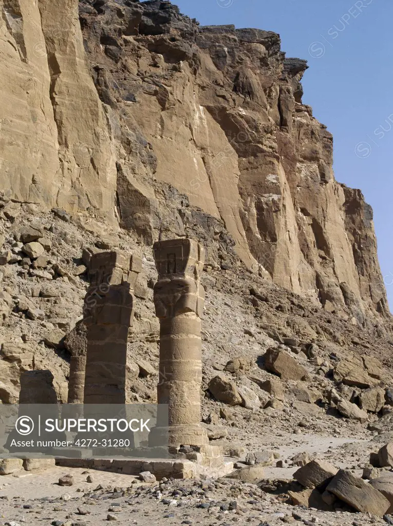 The ruins of an Egyptian temple at the foot of Jebel Barkal Mountain.  The Egyptian New Kingdom (1521-1075 BC) regarded Jebel Barkal as a holy mountain, the seat of  God Amon, and built several temples there. Amon was revered in both Egypt and the Kingdom of Cush as king of the Gods.