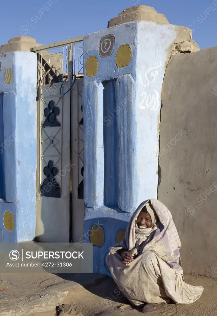 Traditional Nubian architecture and plasterwork of a fine doorway into the courtyard of a house at Qubbat Selim. This village, situated close to the River Nile in Northern Sudan, still retains much of its traditional architecture, plasterwork and decoration.