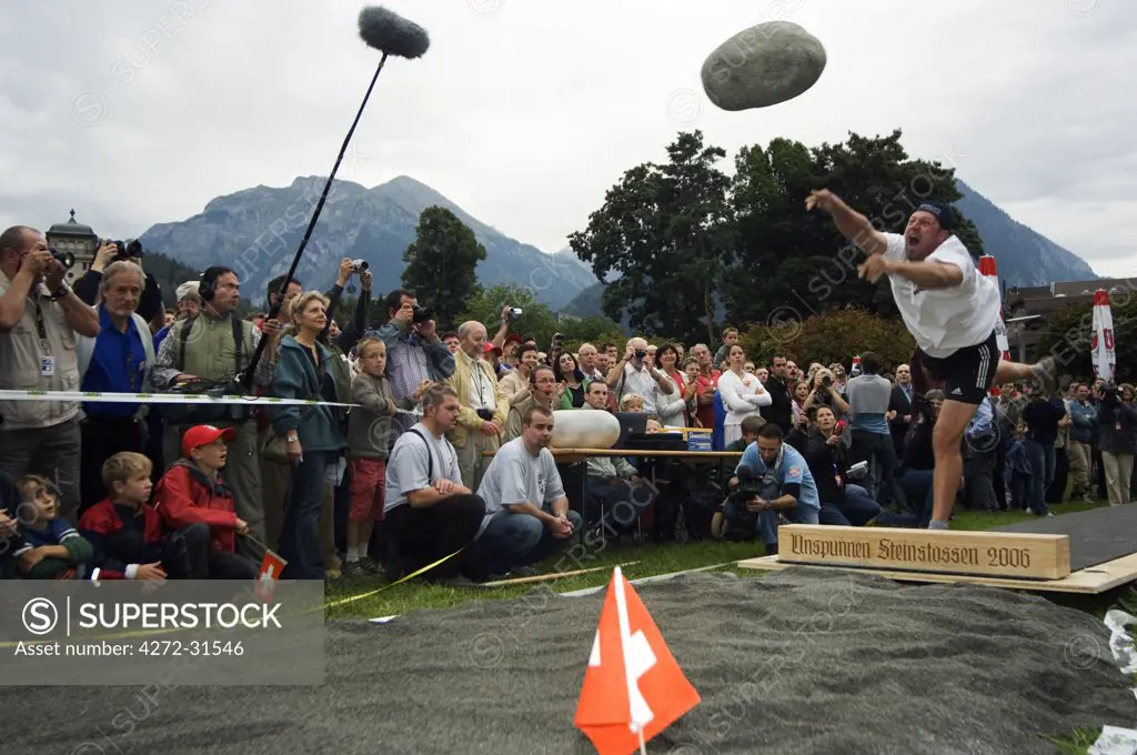 Stone throwing at the Unspunnen Bicentenary Festival, a traditional mountain and alpine competition, Interlaken, Jungfrau Region, Switzerland