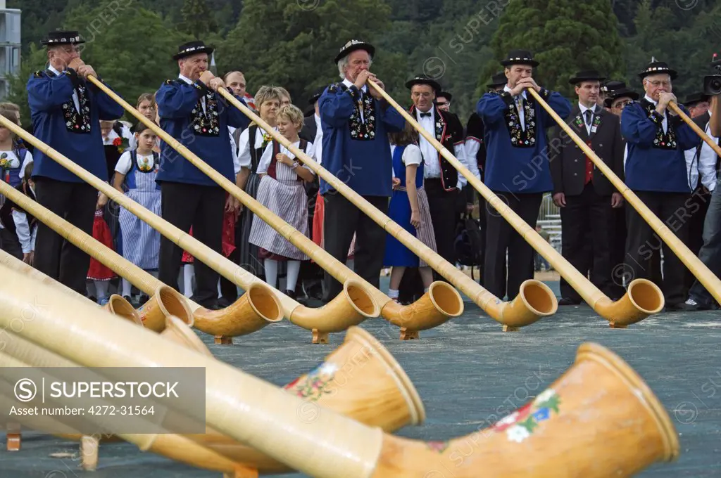 Traditional horn blowers at the Unspunnen Bicentenary Festival, Interlaken, Jungfrau Region, Switzerland