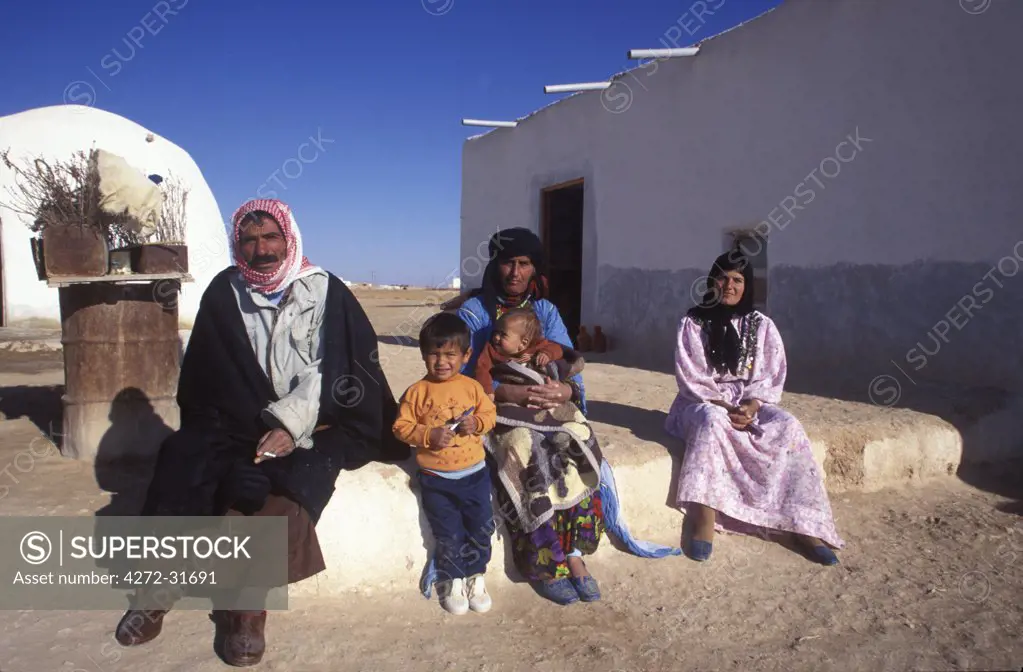 Bedouin family in traditional Bedouin village