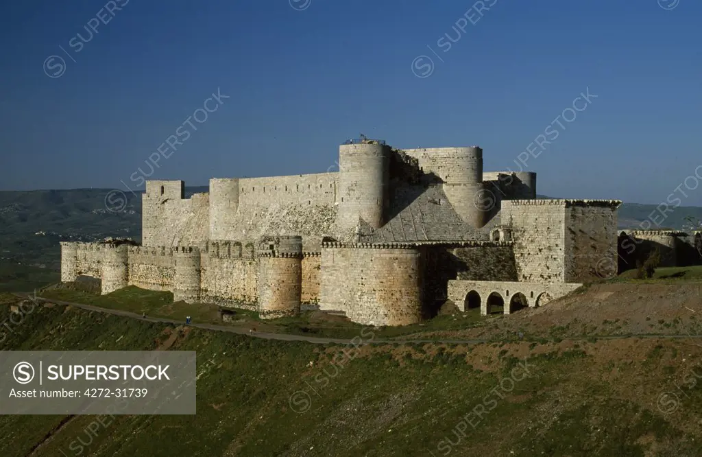 Probably the most celebrated of Crusader castles, the 12th century fortress, Krak des Chevaliers aka Qalaat al-Husn, was built by the Knights Hospitaller  and occupied a prime strategic position.