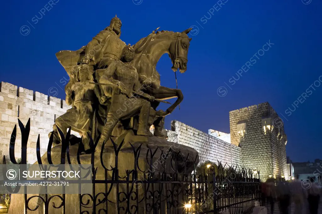 A statue of Saladin stands in front of the citadel, Damascus, Syria