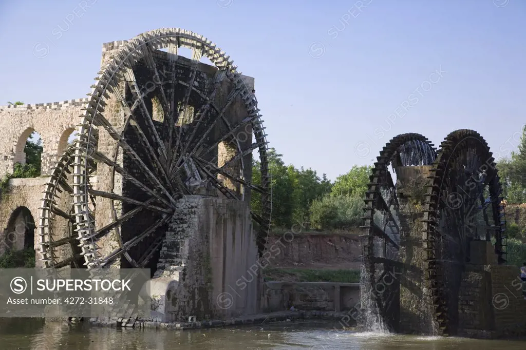 The Norias of Bechriyyat in Hama, Syria. The waterwheels at Hama, known as Norias, are up to 20m high and have been standing since the 13th century