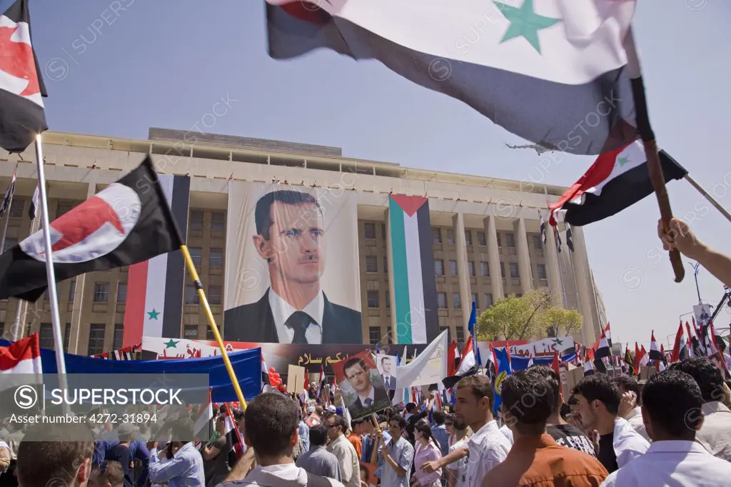 Supporters at a rally in downtown Damascus endorsing President Bashar Al-Assad's unopposed election for a second 7 year term of office. May 2007.