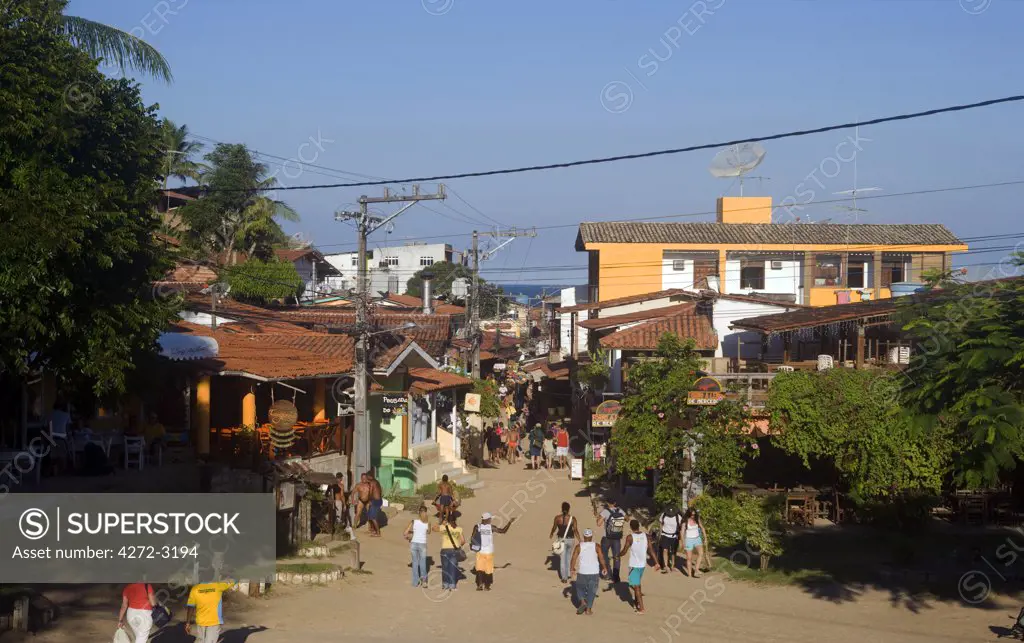 Brazil, Bahia, Camamu Bay. On the island Tinhare, the village of Morro de Sao Paulo's main avenue leads to the other side of the small isthmus (narrow strip of land).