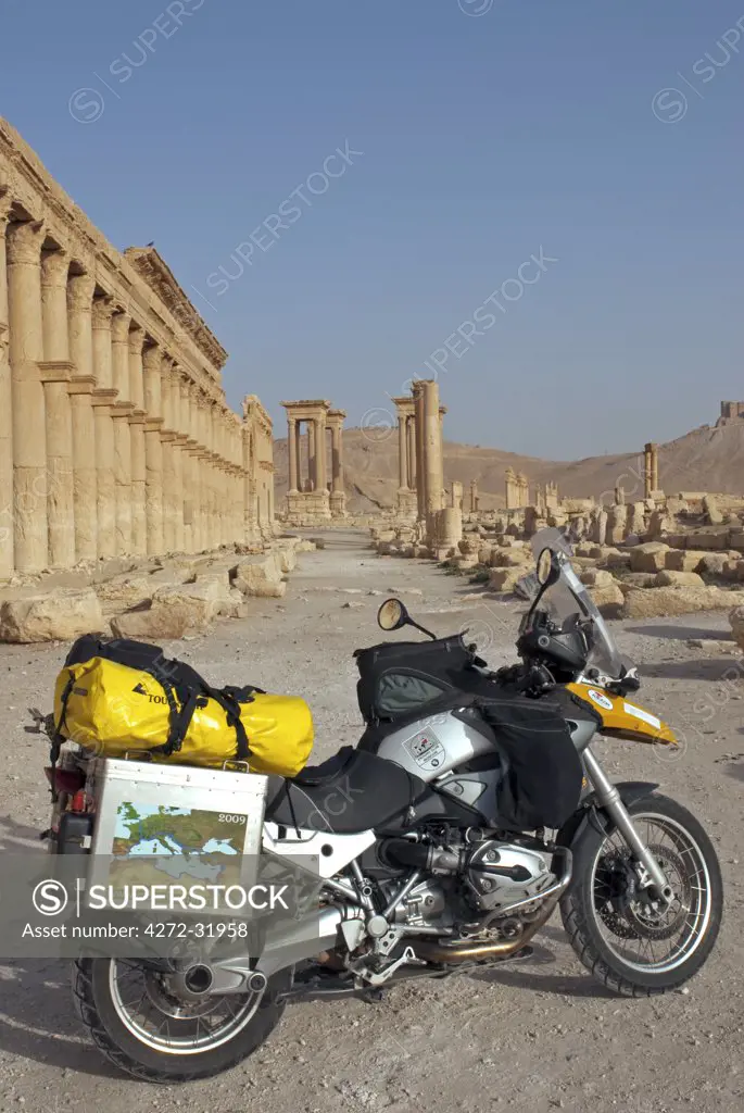 Syria, Palmyra. Motorbike on the cardo maximus.