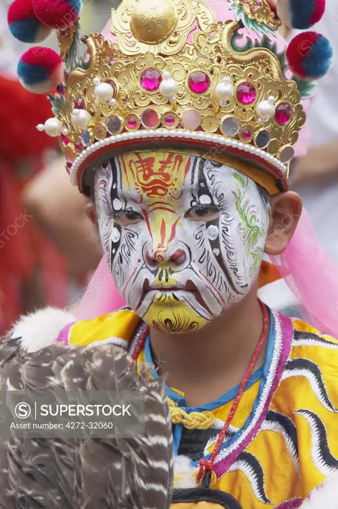 Boy with face paint at Matsu festival, Dajia, Taiwan