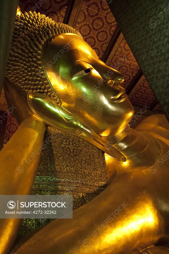 Bangkok, Thailand. The reclining Buddha in Wat Pho. 46 m long and 15 m high gilded