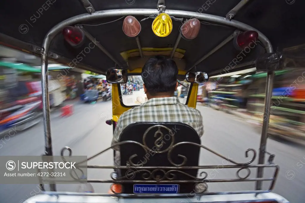 Thailand, Bangkok.  Tut-tuk taxi ride through the streets of Bangkok.
