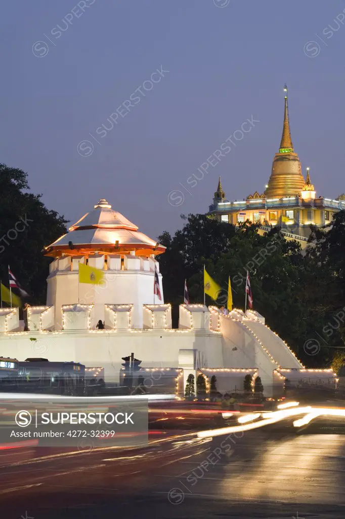 Thailand, Bangkok.  Mahakan Fort with the Golden Mount (Phu Khao Thong) at Wat Saket in the background.