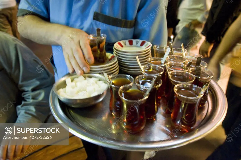 Serving tea at Corlulu Alipasa Medresesi. Istanbul, Turkey