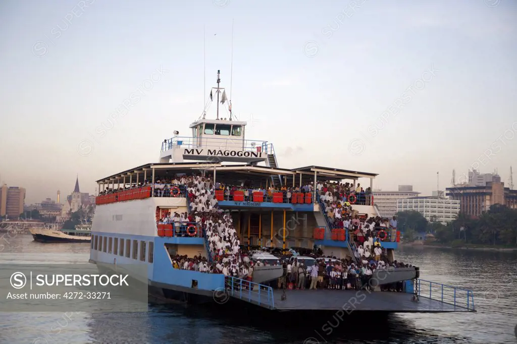 Tanzania, Dar es Salaam. The passenger ferry MV Magogoni crosses the Dar harbour towards Kigamboni.