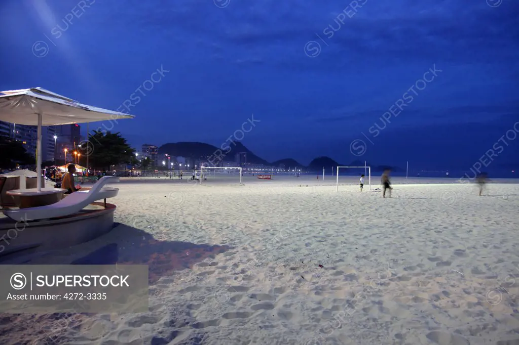 Brazil, Copacabana Beach in Rio de Janeiro at dusk.