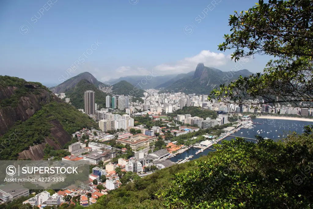 View from Sugarloaf Mountain over Rio de Janeiro with the Corcovado in the background. Brazil