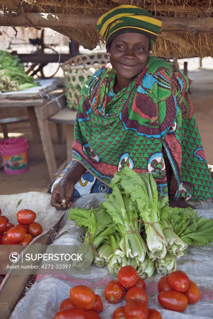 A roadside vegetable seller at Mofu Market.