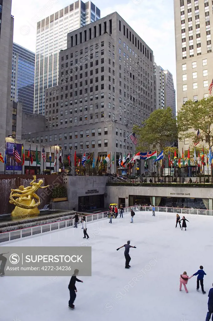 Ice skaters on the rink  at  the Rockefeller Center