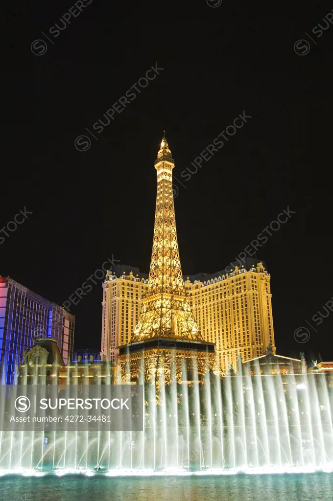 USA, Nevada, Las Vegas. Paris Las Vegas Casino, Eiffel Tower reproduction and Aquatic water show