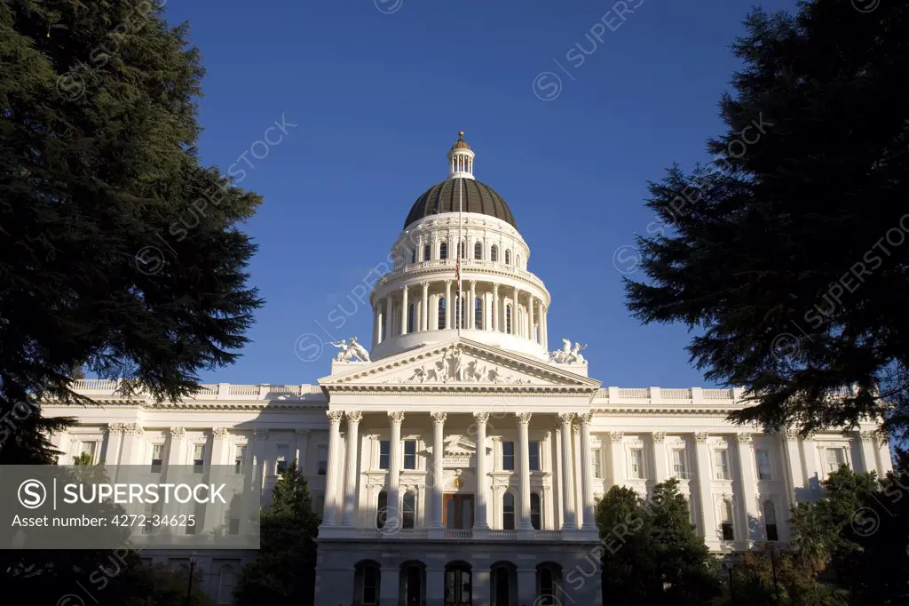 United States, California; Sacramento. Wide-angle view of the west facade of the State Capitol building.