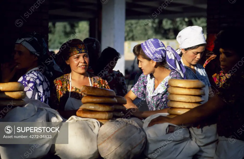 Uzbek women at a bread stall in the market