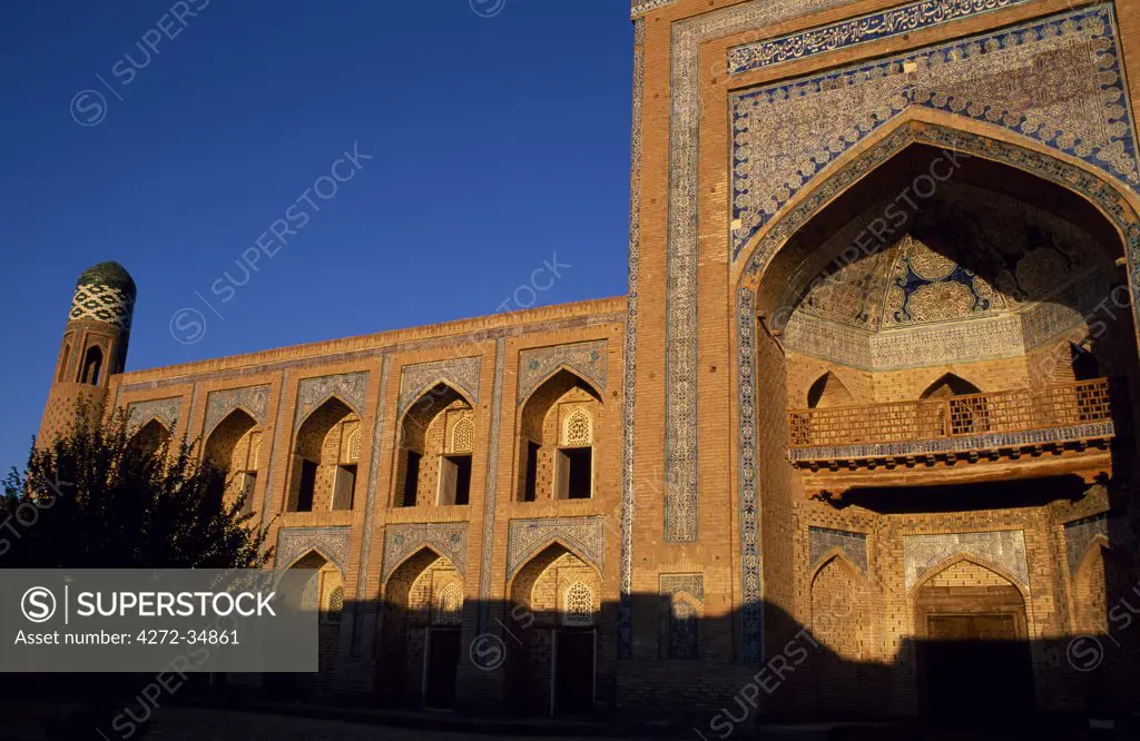 The arched entrance and windows of a mosque in the old city of Khiva