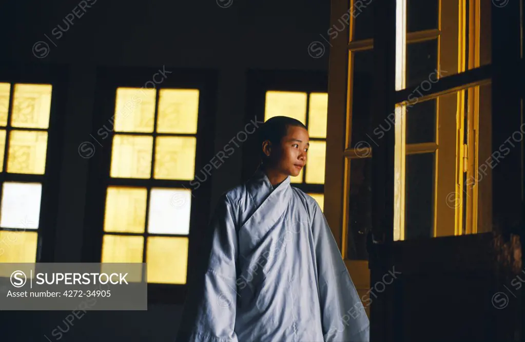 Nun inside the Linh Phong Pagoda (also known as Su Nu Pagoda)