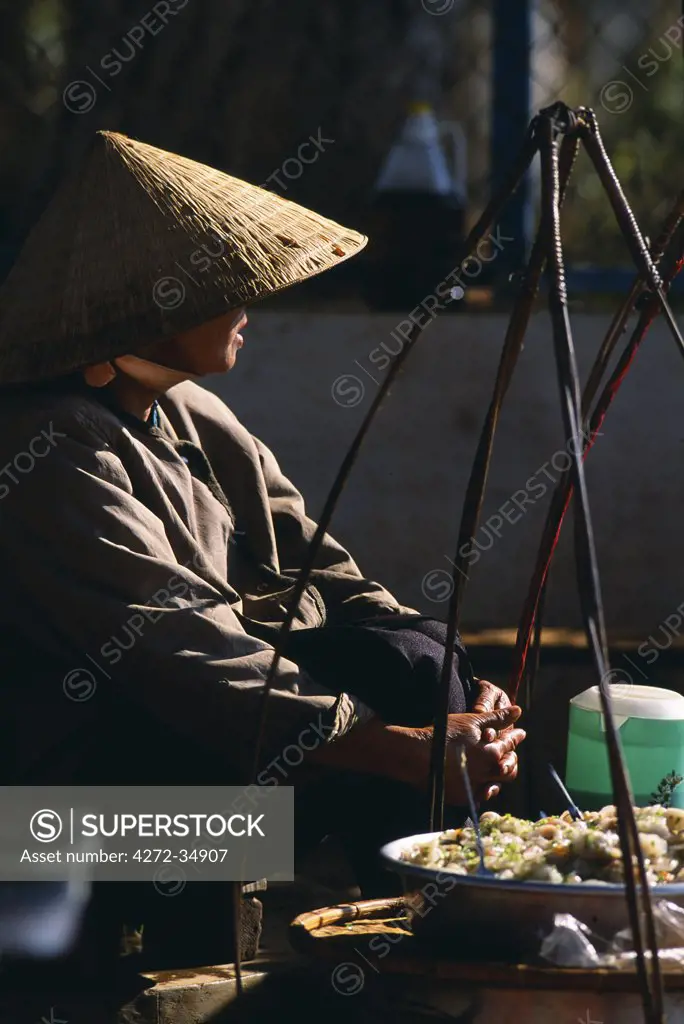 Vendors selling freshly cooked vegetables, soups & noodles in the Central Market