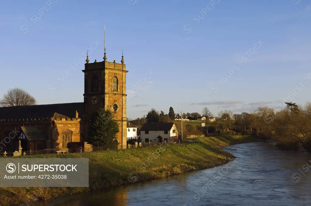 Wales, Wrexham, Bangor-on-Dee. Bangor-on-Dee's sandstone church, Sant Dunawd's, sits beside the River Dee.