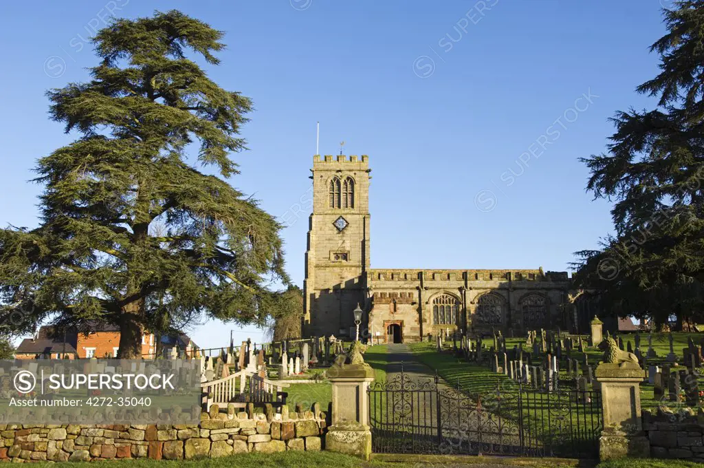 Wales, Wrexham, Hanmer. St Chad's Church sits on top of a small knoll looking down on the Mere.