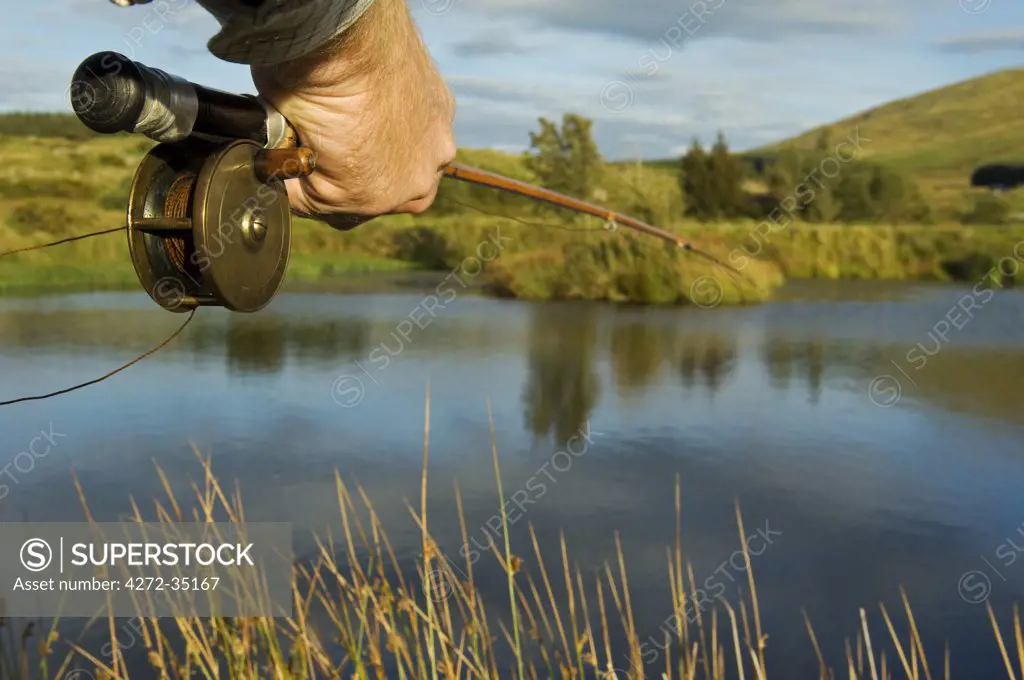 UK, Wales, Conwy. Trout fishing at a hill lake in North Wales (MR)