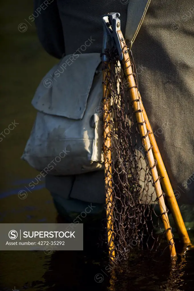 Wales; Wrexham. Traditional fishing net and canvas bag used by a trout fisherman