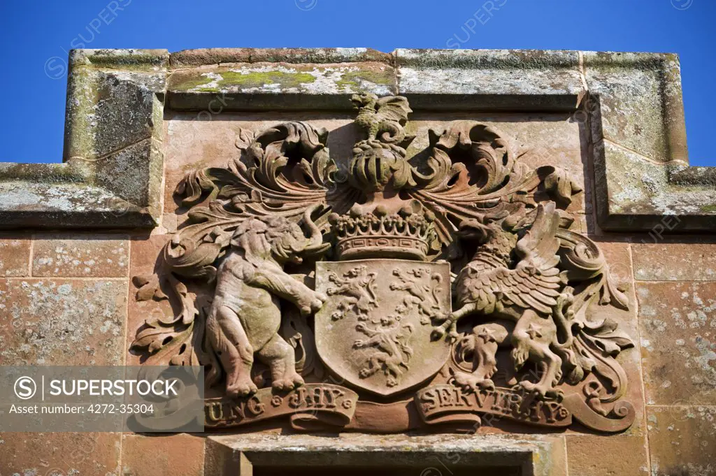 Wales; Powys; Welshpool. The Herbert coat of arms above the archway leading to the castle entrance at  Powis Castle