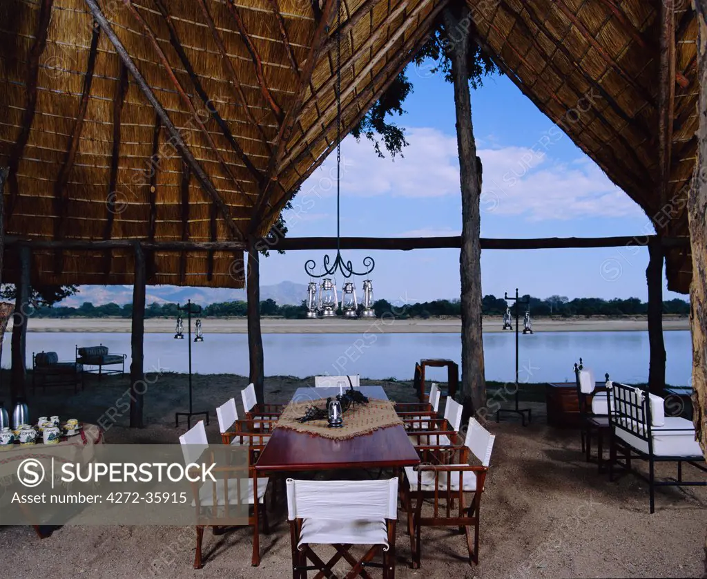 Dining room looks over the Luangwa River at Chamilandu Camp