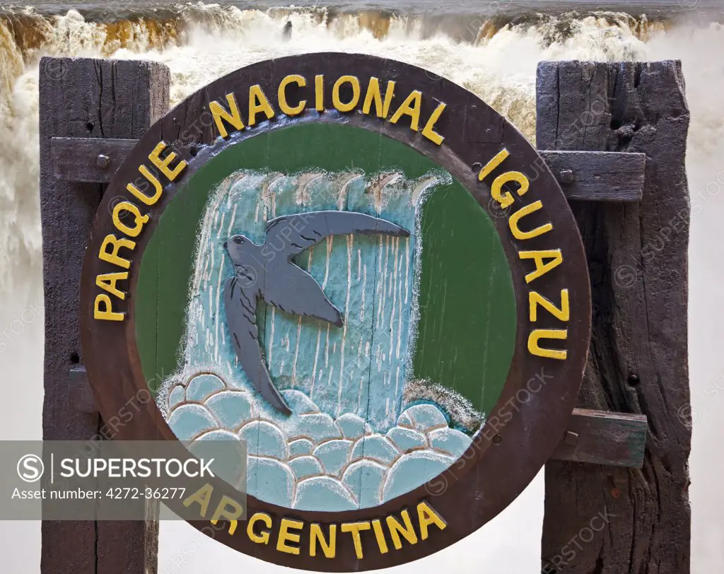 A signboard with the emblem of the Iguazu National Park, a World Heritage Site.