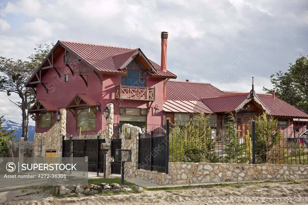 A large modern house on the outskirts of Ushuaia.
