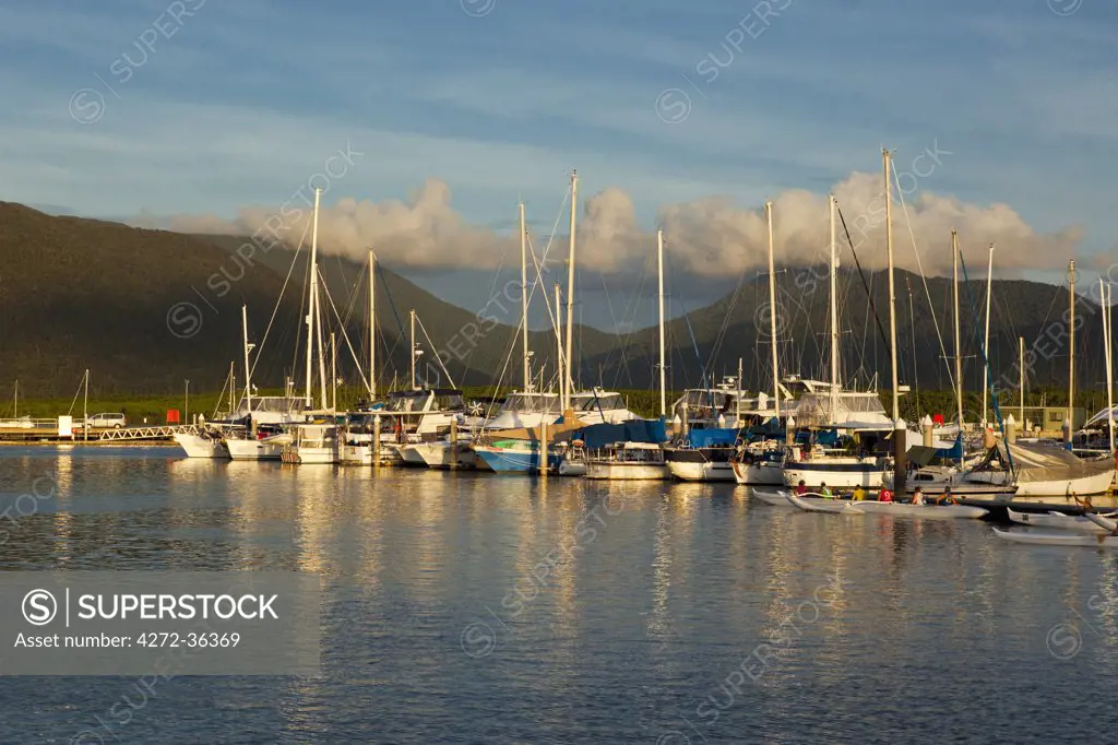 Australia, Queensland, Cairns.  Boats in Marlin Marina at sunset.