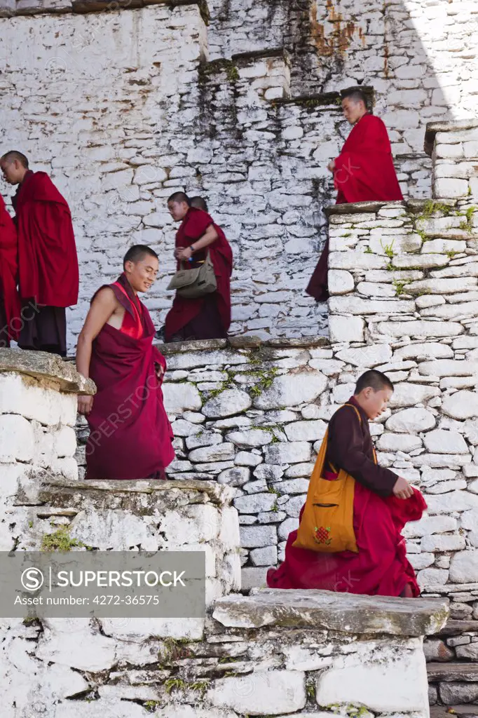 Monks at Kurjey Lhakhang, the final resting place of the remains of the first three kings of Bhutan.