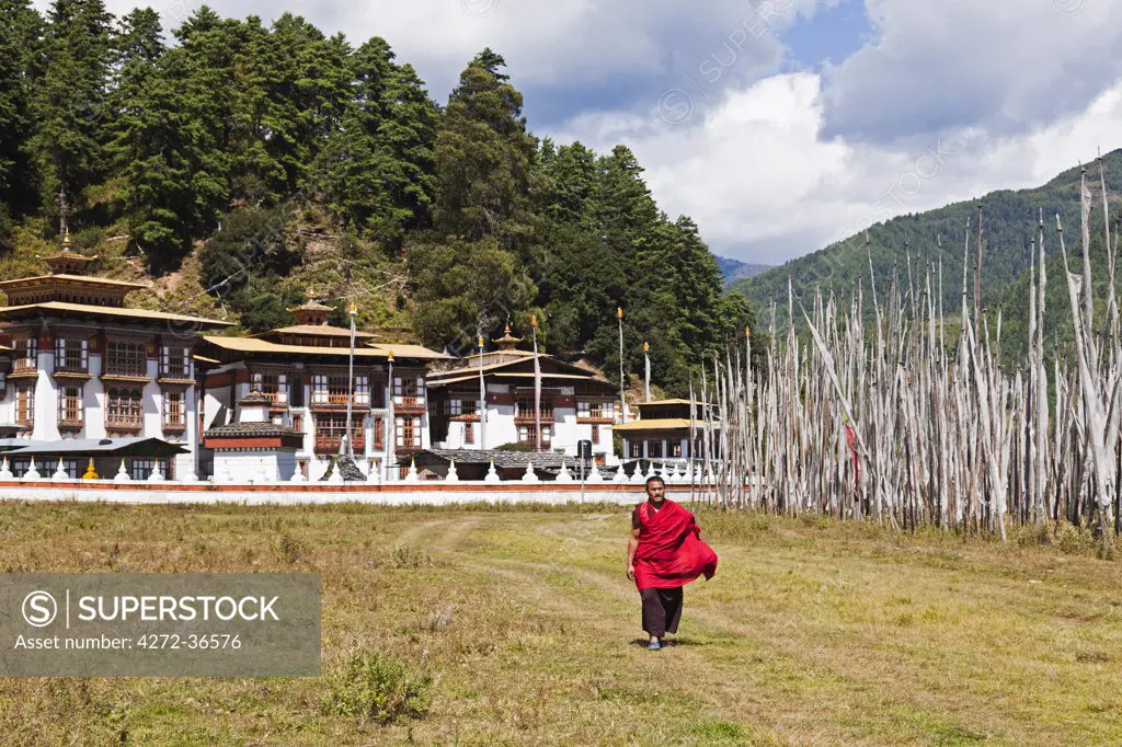 Monk at Kurjey Lhakhang, the final resting place of the remains of the first three kings of Bhutan.