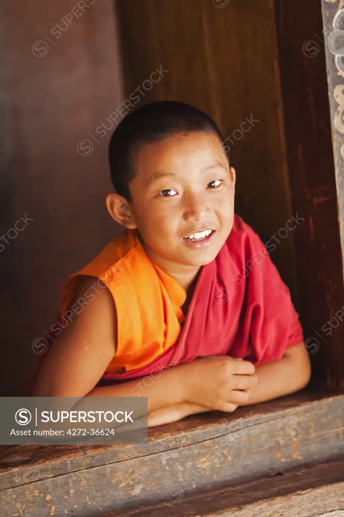 Young monk at Chimi Lhakhang, built in 1499 by the 14th Drukpa hierarch, Ngawang Choegyel.