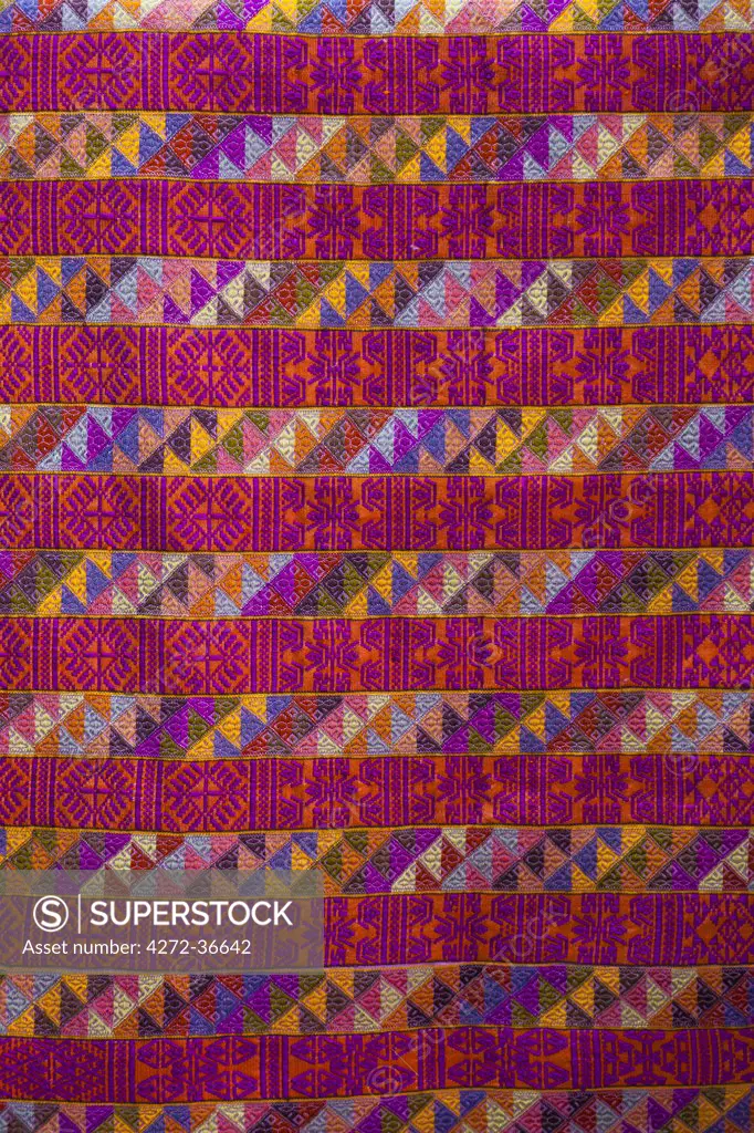 A stunning piece of woven material, with a modern design, to be used for a lady's traditional kira, the national dress for Bhutanese women.