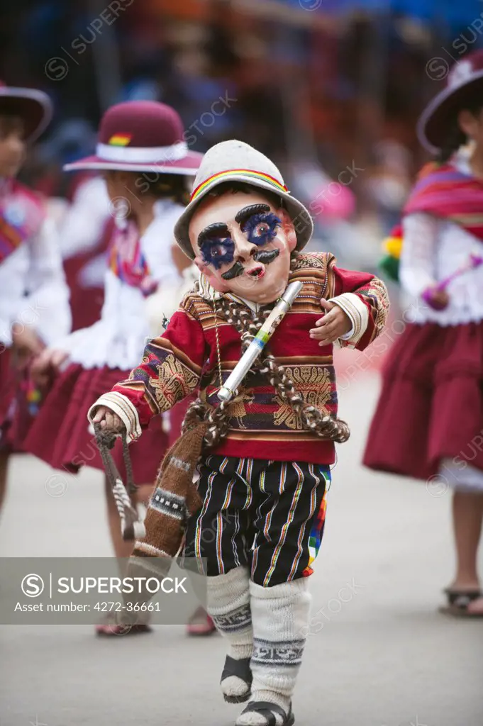 South America, Bolivia, Oruro, Oruro Carnival; Boy in costume