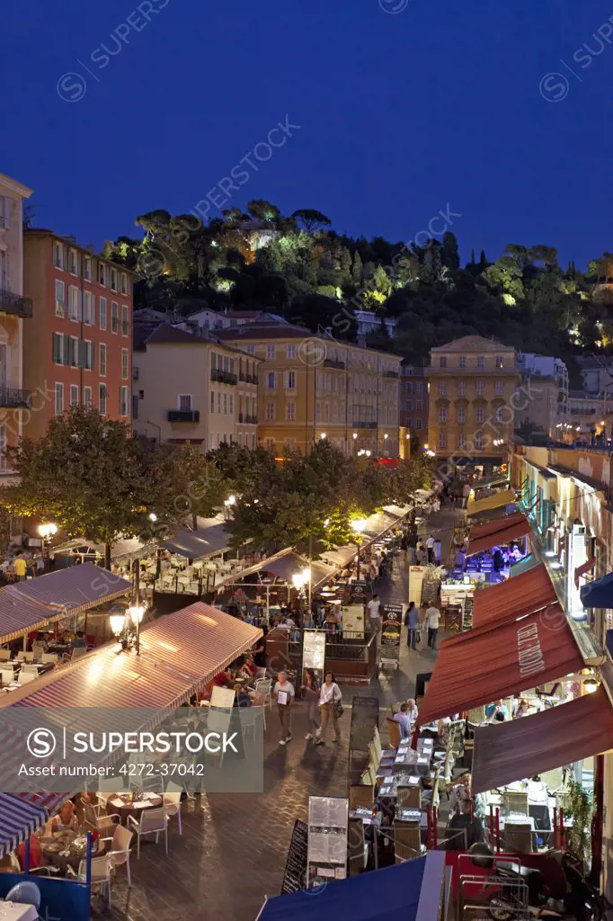 Nice, Provence Alpes Cote d'Azur, France. The street market stalls and restaurants of Place Charles Felix in the old town of Nice  by night