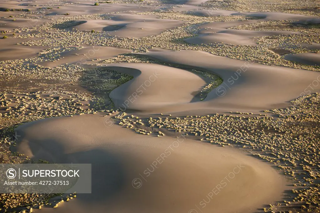 Barchan dunes in the hospitable, low-lying Suguta Valley of northern Kenya.