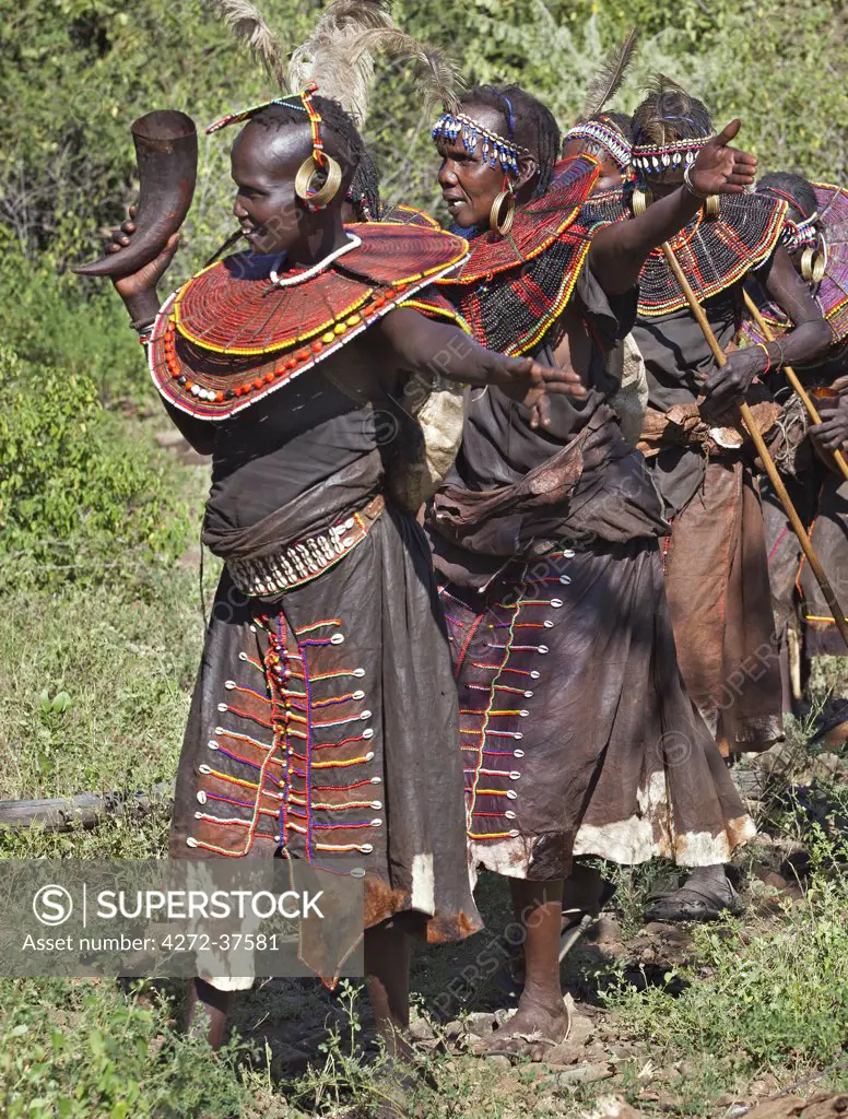 Pokot women sing and dance at the conclusion of a Sapana ceremony.