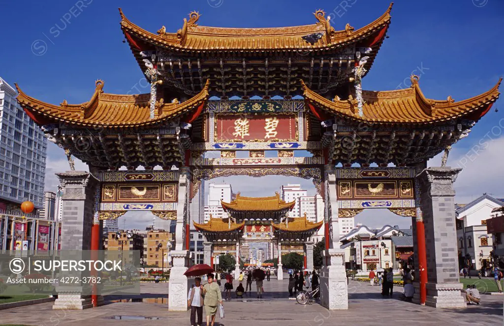 A ceremonial arch stands in the heart of Kunming's Jinbi Square