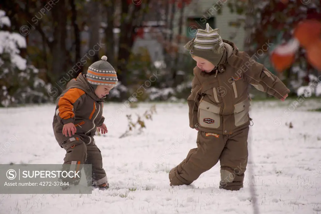 Sakhalin, Yuzhno-Sakhalin, Russia; Two children playing in the snow