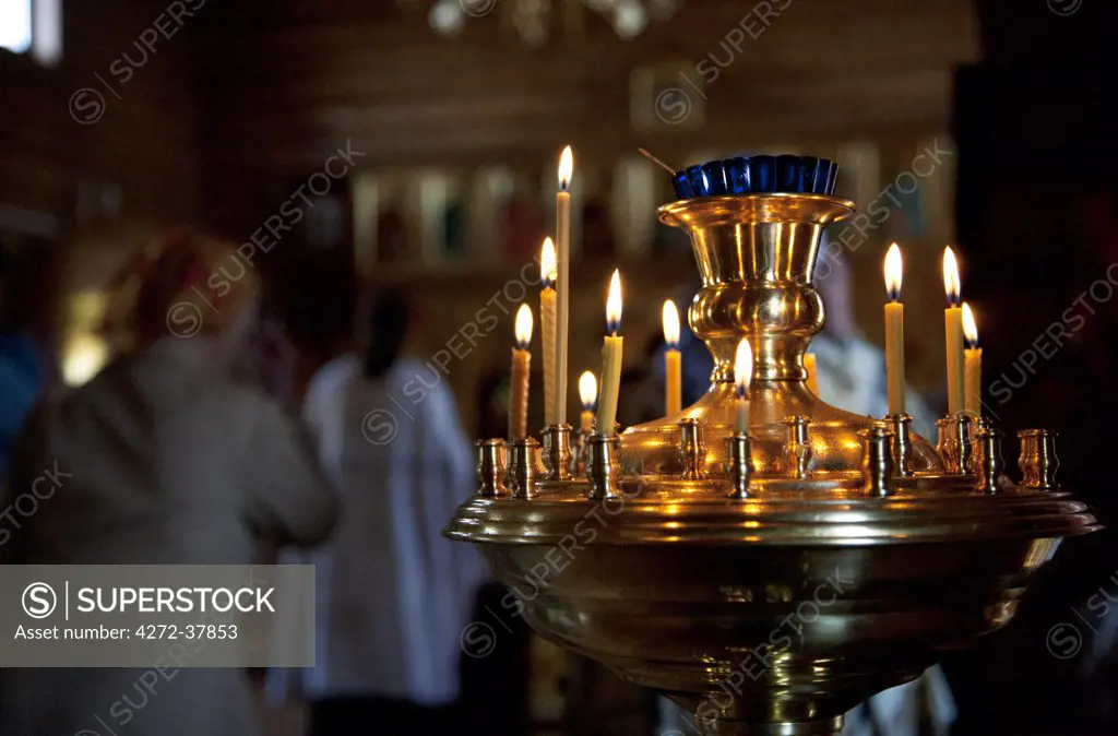 Sakhalin, Yuzhno-Sakhalin, Russia; During a Russian Orthodox ceremony in a traditonally wooden-built church