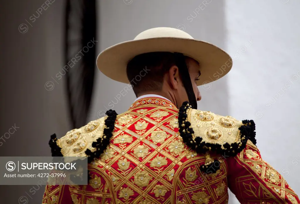 Spain, Andalusia, Seville; A 'picador' in an elegant traditional costume just before his entrance to the arena for a bull-fight